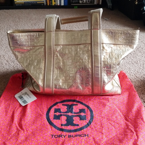 Tory Burch Handbags - TORY BURCH Leather gold tote w/dust cover